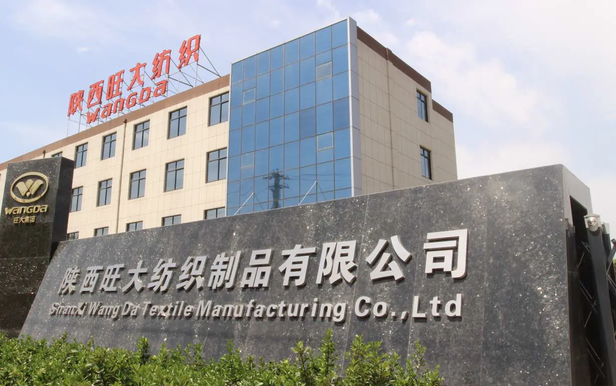 Entrance sign and main building of Wangda Textile in Xi’an